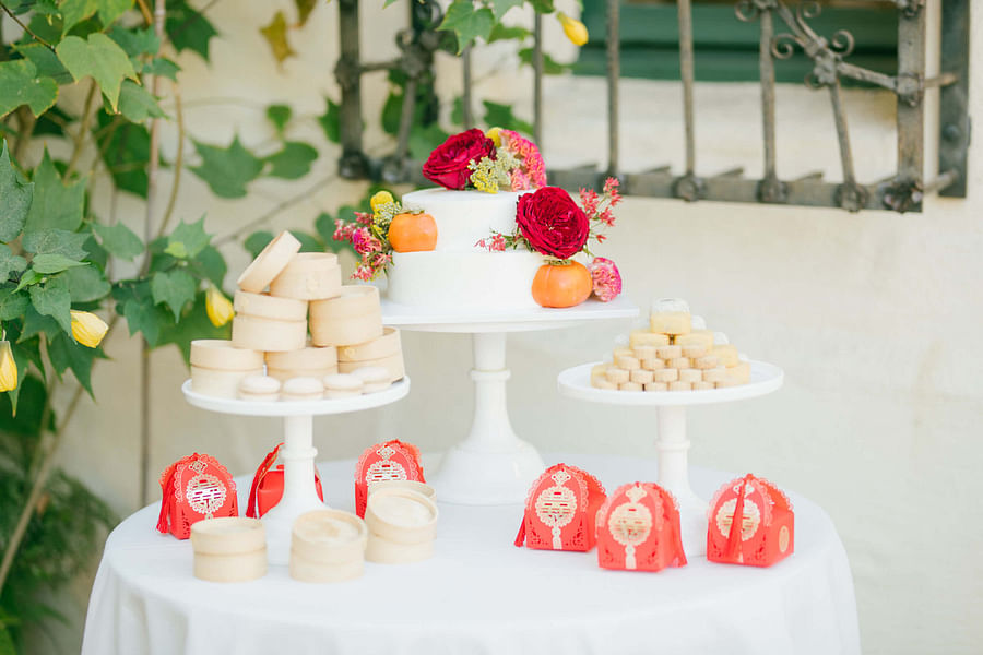 Assorted Asian desserts beautifully arranged on a wedding dessert table