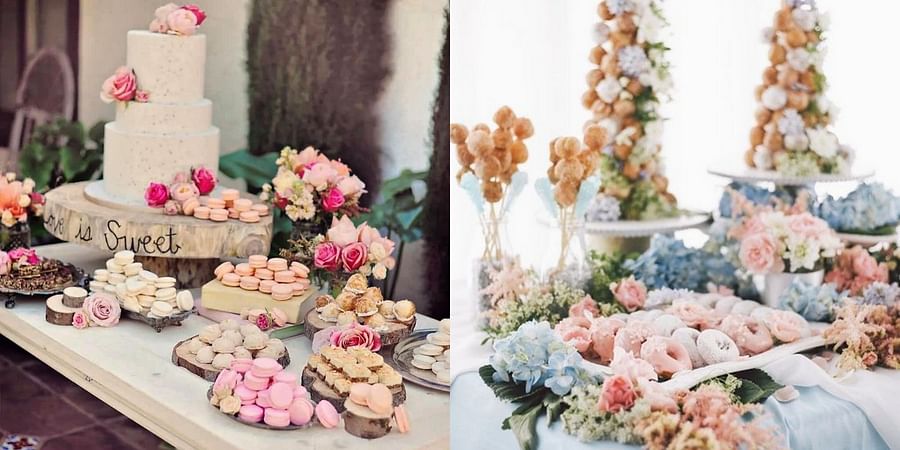 Array of traditional Indian desserts beautifully arranged on a decorated wedding table