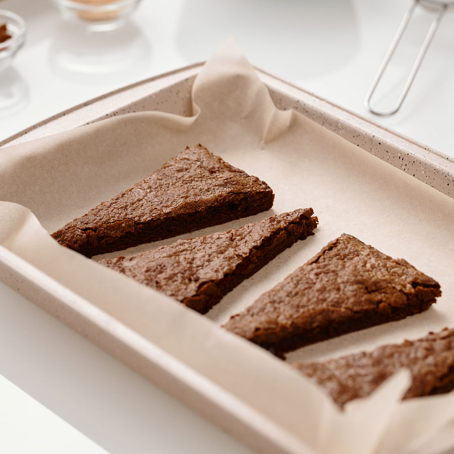 Person mixing ingredients for a dessert dip