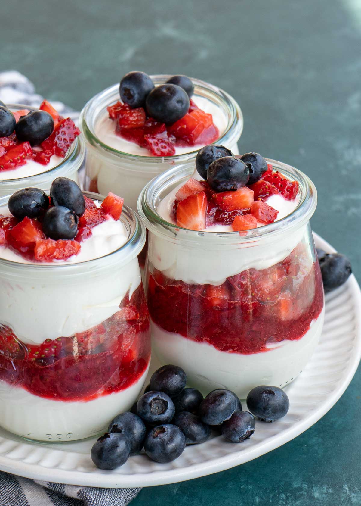 Delicious no-bake lemon cheesecake, chocolate covered strawberries, and Greek yogurt berry parfait